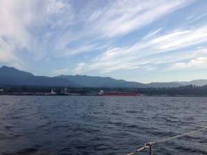 Port Angeles logging operations, loading logs on a transport ship