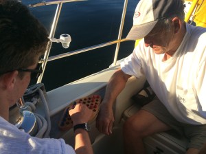 Ralph and Noah squaring off at an old form of checkers